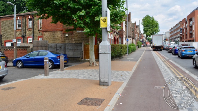 Protected cycleway with filtered side road, Waltham Forest, London, England