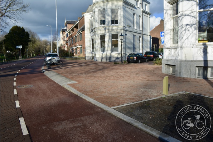 Narrowed road with continuous footway and wide cycle lanes, Utrecht, NL