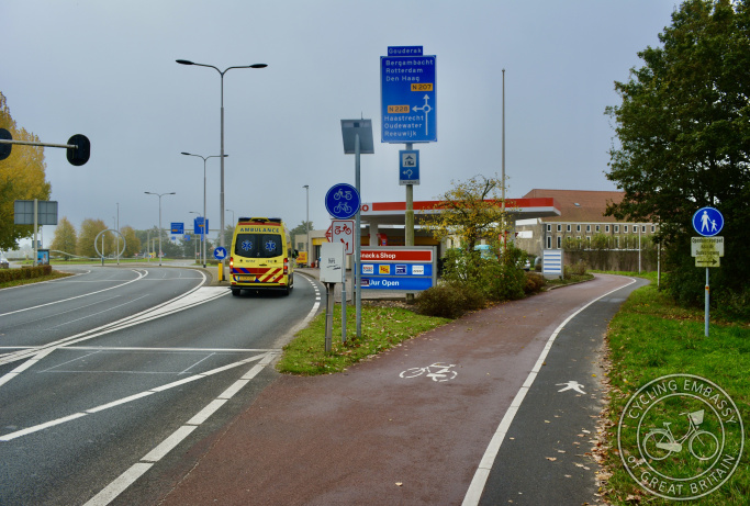 Cycle path passing behind petrol station, Gouda, The Netherlands